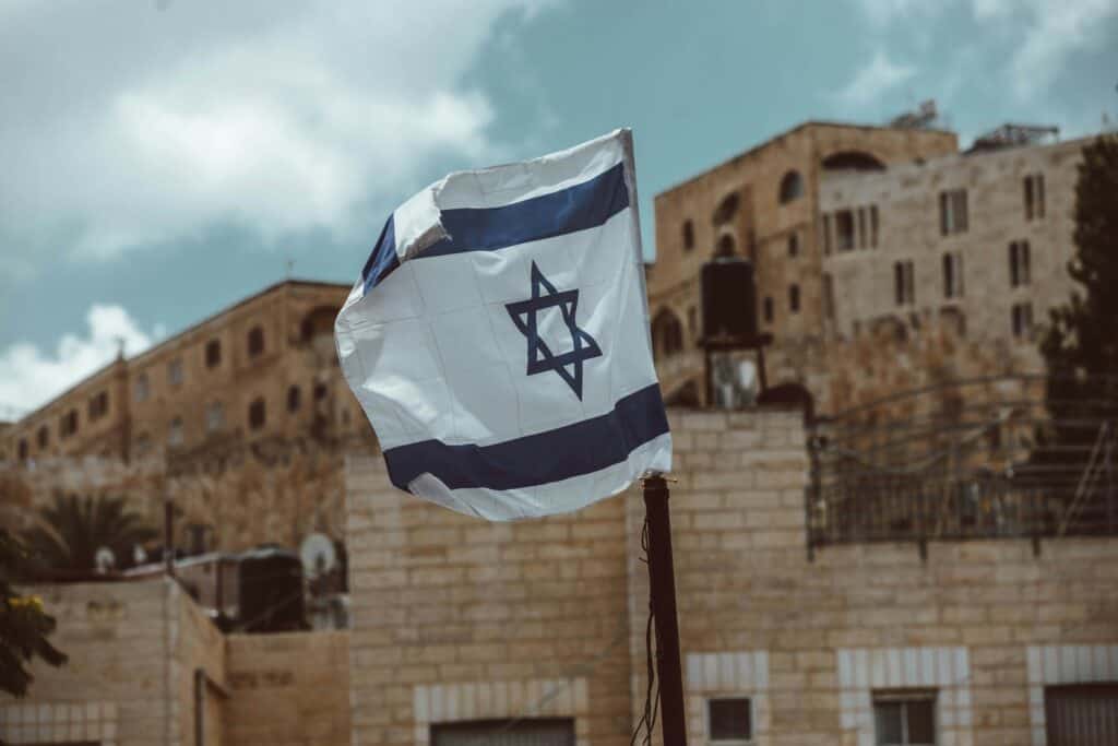 buildings and Israel flag
